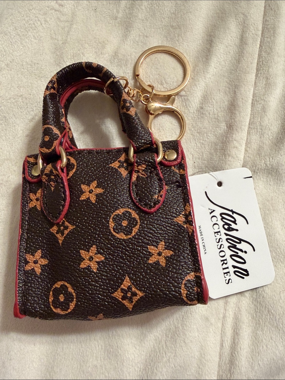 Mini Brown Monogram Keychain Bag with Pink Trim. (85)